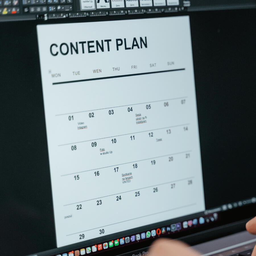 Image of a computer monitor with a content plan calendar on the screen.